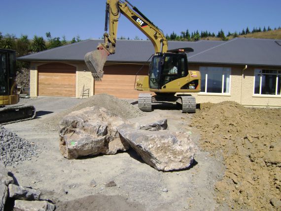 Supply & placement of feature rocks - Nelson Earthworks