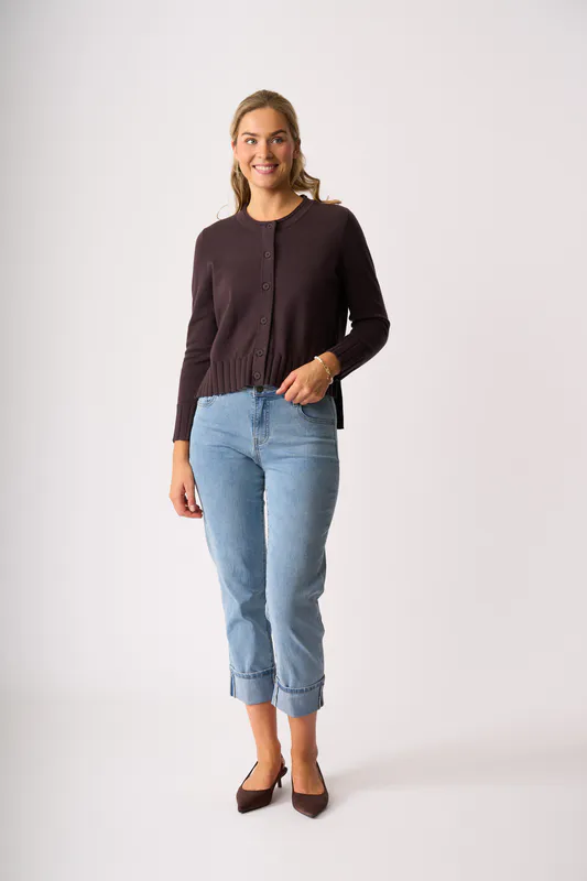 Model wearing Chocolate Best Feature Cardigan By Foil Available at Beetees Nelson