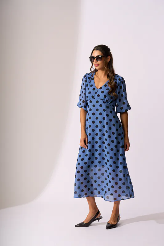 Model wearing Bluebell Spot V Neck Features Dress By Memo Available at Beetees Nelson