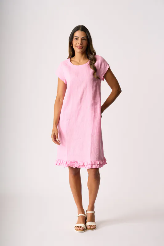 Model wearing Pink Ruffle Dreams Dress By Foil Available at Beetees Nelson