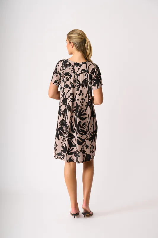 Model wearing Shadow Frond Dress - Swing Back By Foil Available at Beetees Nelson