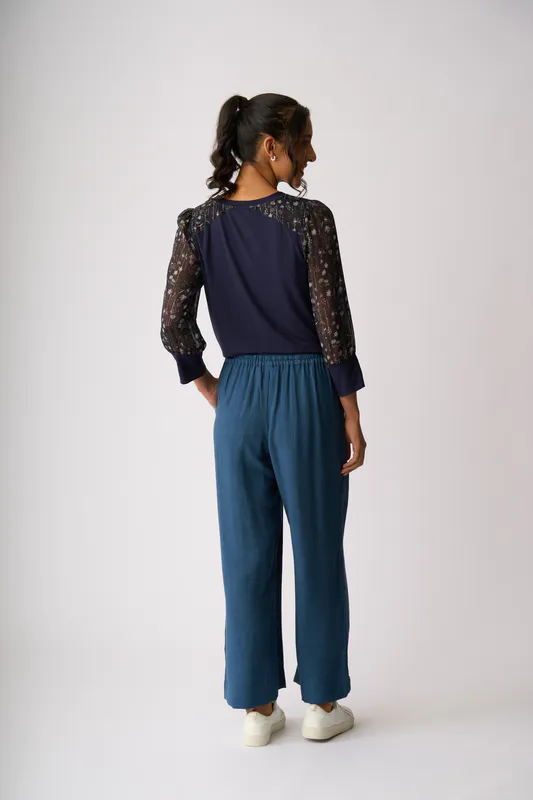 Model wearing Twilight Floral Contrast Woven Shoulder Top By Memo Available at Beetees Nelson