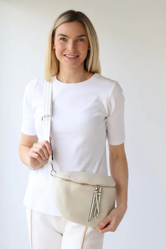 Model wearing Stone Cross Body Zip Detail Bag By Archer House Available at Beetees Nelson