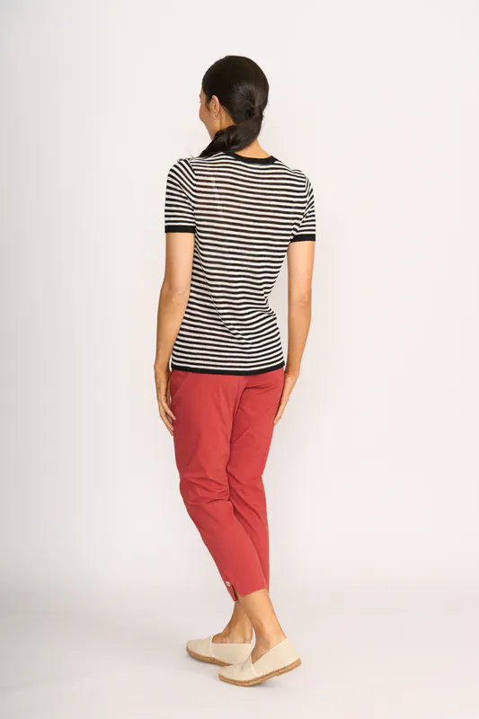 Model wearing Black & White Why Not Top By Foil Available at Beetees Nelson