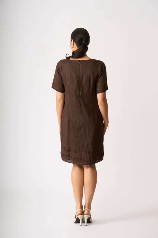 Model wearing Cocoa Crowd Pleaser Dress By Foil Available at Beetees Nelson