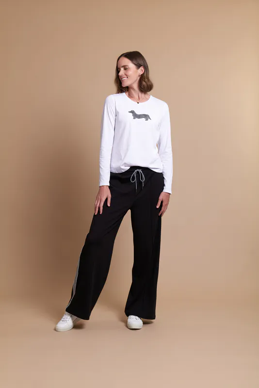 Model wearing Black Coloured Trousers - Wide Leg, Black Sides Stripes By Memo Available at Beetees Nelson