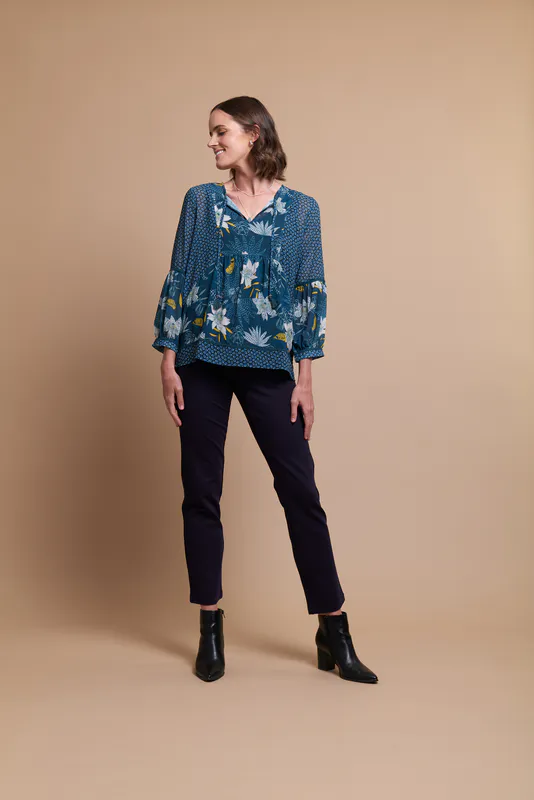 Model wearing Starlight Blooms/Navy Ditsy Coloured Top - Relaxed, Balloon Sleeve By Memo Available at Beetees Nelson