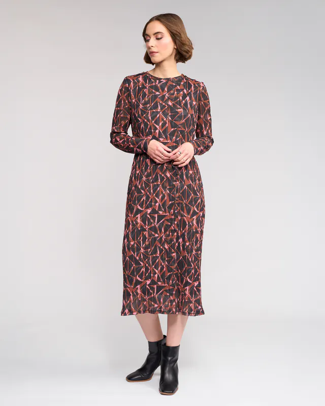 Model wearing Celine Feddie Dress By Knewe Available at Beetees Nelson