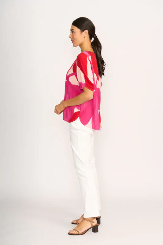 Model wearing Petals Podium Top By Foil Available at Beetees Nelson