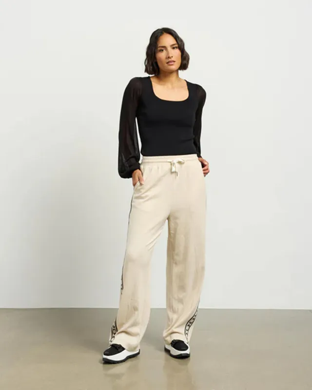 Model wearing Almond Braxton Pant By Et Alia Available at Beetees Nelson
