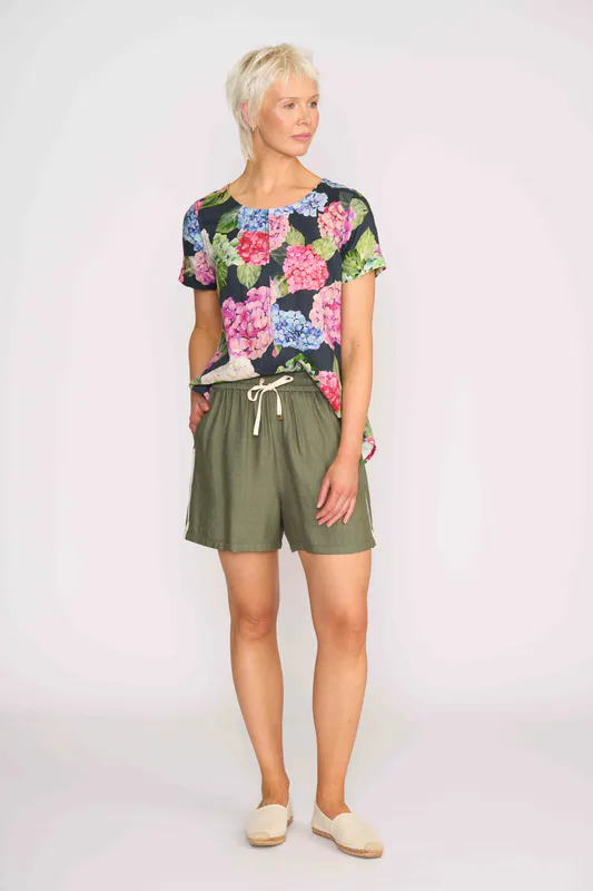 Model wearing Hydrangea Top - Swing, Up Down Hem By Preen Available at Beetees Nelson