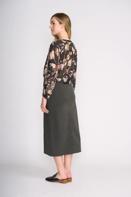 Model wearing Shadow Leaf Pipeline Blouse By Foil Available at Beetees Nelson