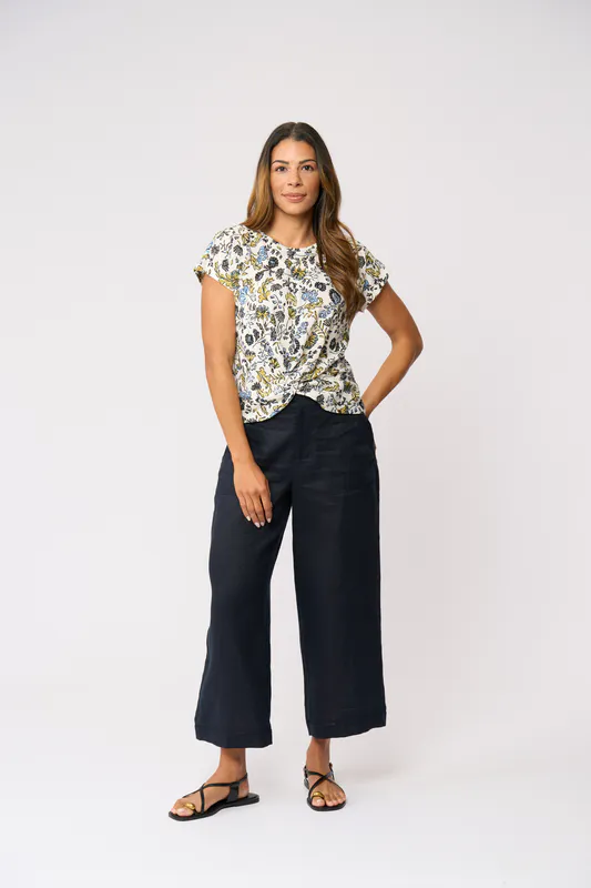 Model wearing Folk Story Do The Twist Top By Foil Available at Beetees Nelson