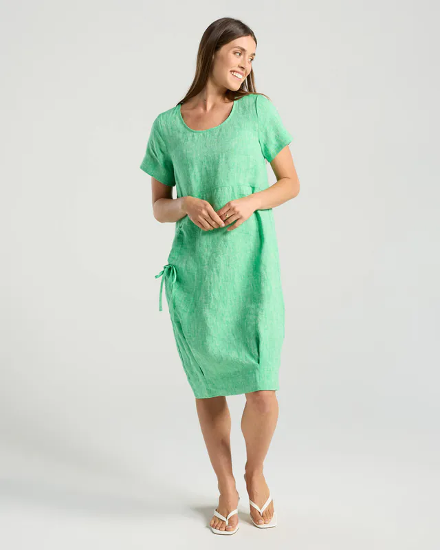 Model wearing Chocolate Sabina Bubble Hem Cd Dress By Blackstone Available at Beetees Nelson