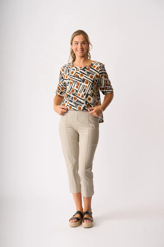 Model wearing Toffee Maze Pleat Back Top By Foil Available at Beetees Nelson