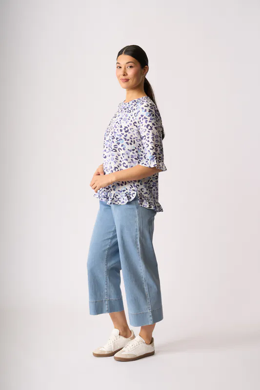 Model wearing Game on Scoop Hem Top By Foil Available at Beeteees Nelson