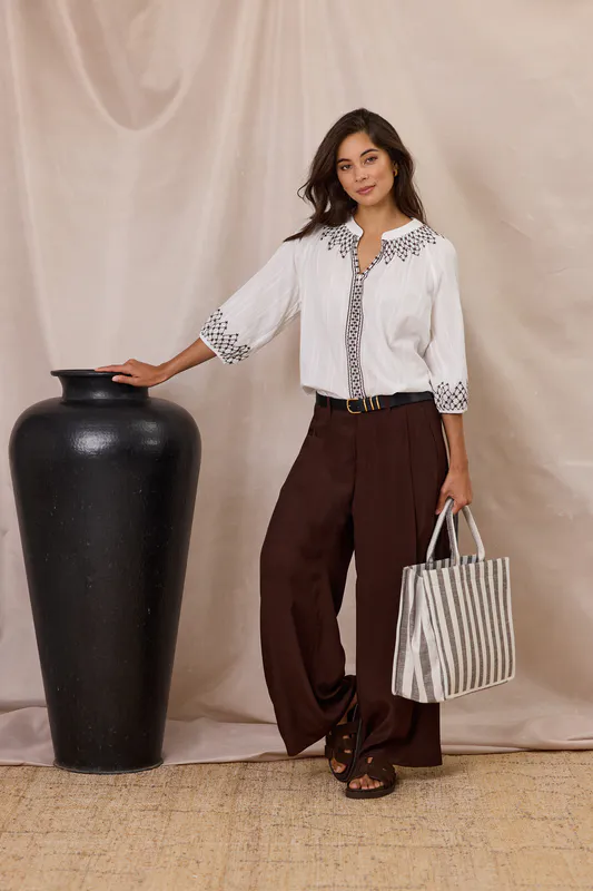 Model wearing Cocoa Stripe Breeze Tote Bag By Design Nation Available at Beetees Nelson
