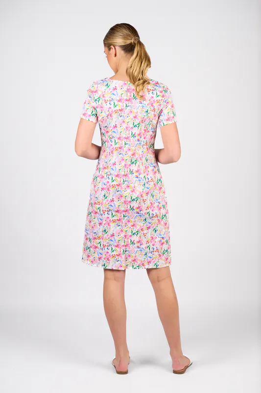 Model wearing Porto Printed Lightweight Fitted Dress with Short Sleeve By Vassalli Available at Beetees Nelson