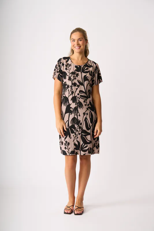 Model wearing Shadow Frond Dress - Swing Back By Foil Available at Beetees Nelson