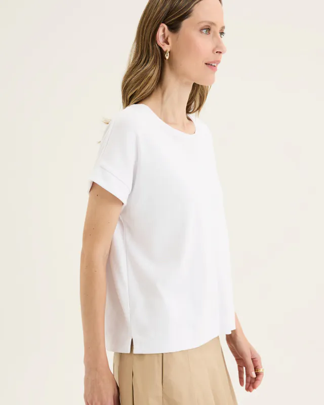 Model wearing White Solitude Tee By Yarra Trail Available at Beetees Nelson