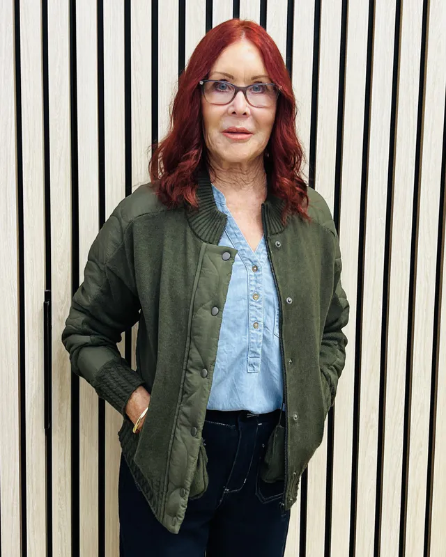 Model wearing Khaki Knit & Wowen Bomer Jacket By Oh Three Available at Beetees Nelson