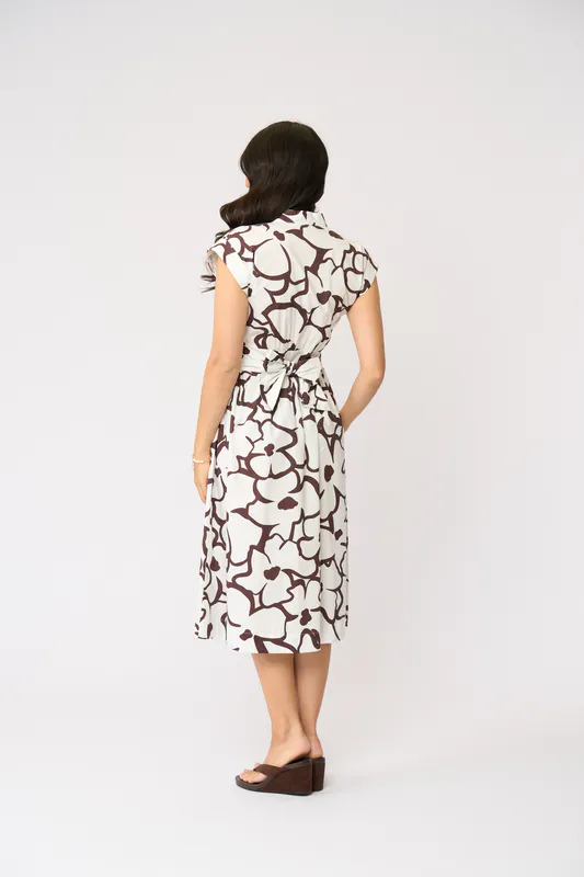 Model wearing Upsa-Daisy Gifted Dress By Foil Available at Beetees Nelson
