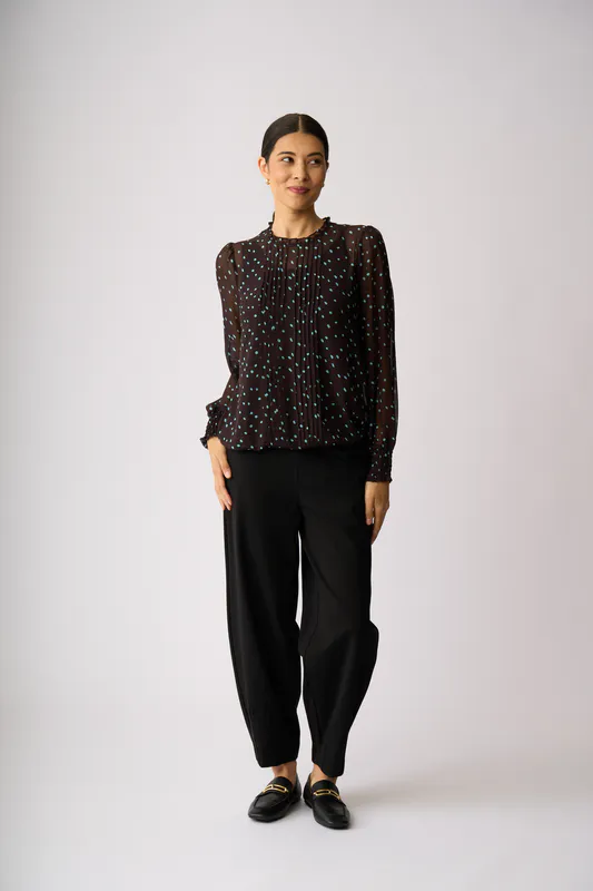 Model wearing Sky Coco Spot Pintuck Front, Shirred Cuff Blouse By Memo Available at Beetees Nelson