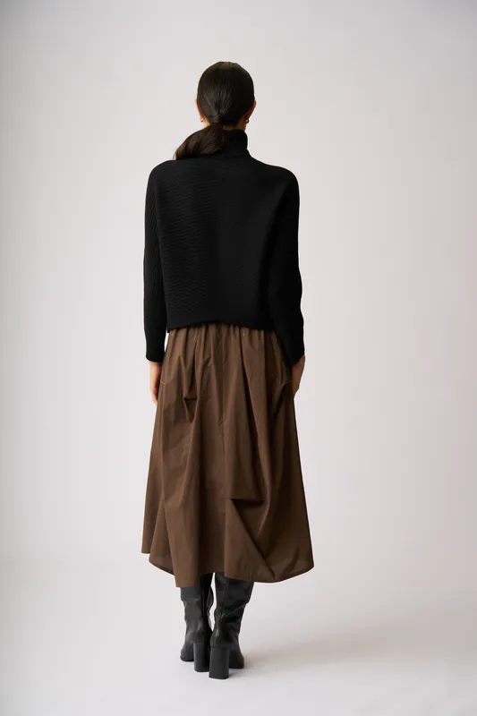 Model wearing Black Chevron Rib Roll Neck Sweater By OH Three Available at Beetees Nelson