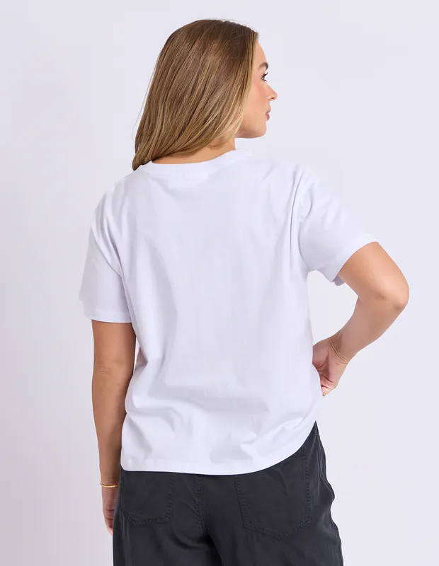 Model wearing Cornflower Blue Studio Rose Tee By Foxwood Available at Beetees Nelson