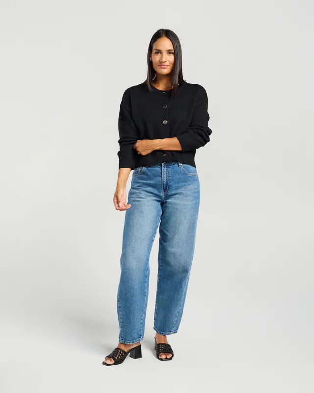 Model wearing Black Poppy Cardi By Et Alia Available at Beetees Nelson