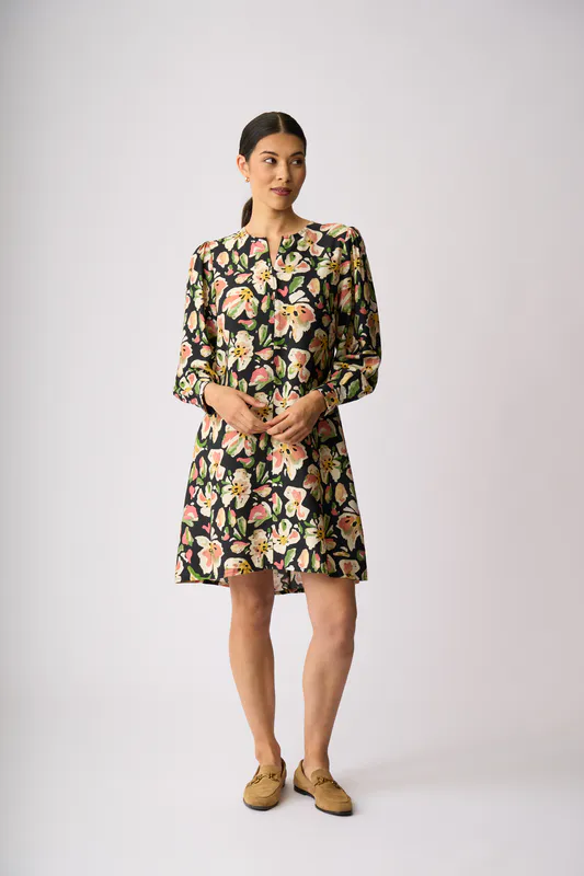 Model wearing Forest Flora Zip Front Dress By Preen Available at Beetees Nelson