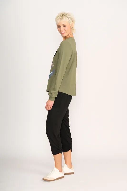 Model wearing Sage Flocked Floral Sweater - Wander By Memo Available at Beetees Nelson