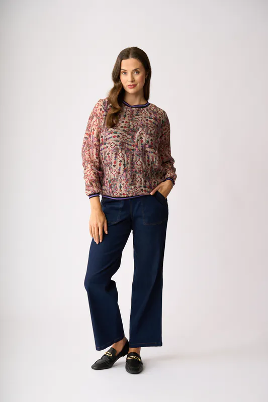 Model wearing Gems Sheer Sleeve, Rib Detail Top By Memo Available at Beetees Nelson