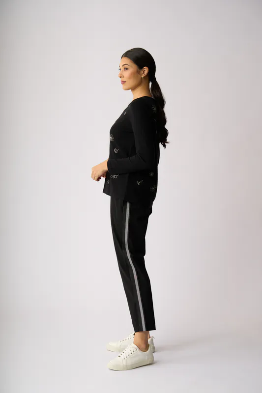 Model wearing Blooms Blooms Sweater By Foil Available at Beetees Nelson