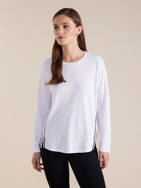Model wearing White Long Sleeve Zip Trim Tee By Marco Polo Available at Beetees Nelson