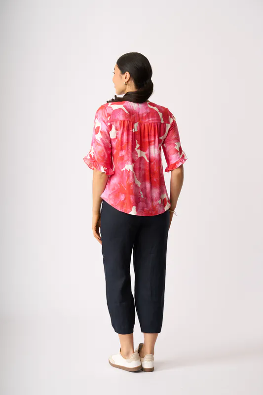 Model wearing Fantasia Ruffle Sleeve Scoop Top By Foil Available at Beetees Nelson