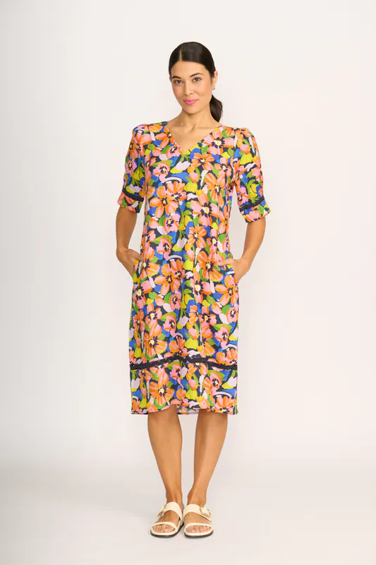 Model wearing Summer Burst Trim Time Dress By Foil Available at Beetees Nelson