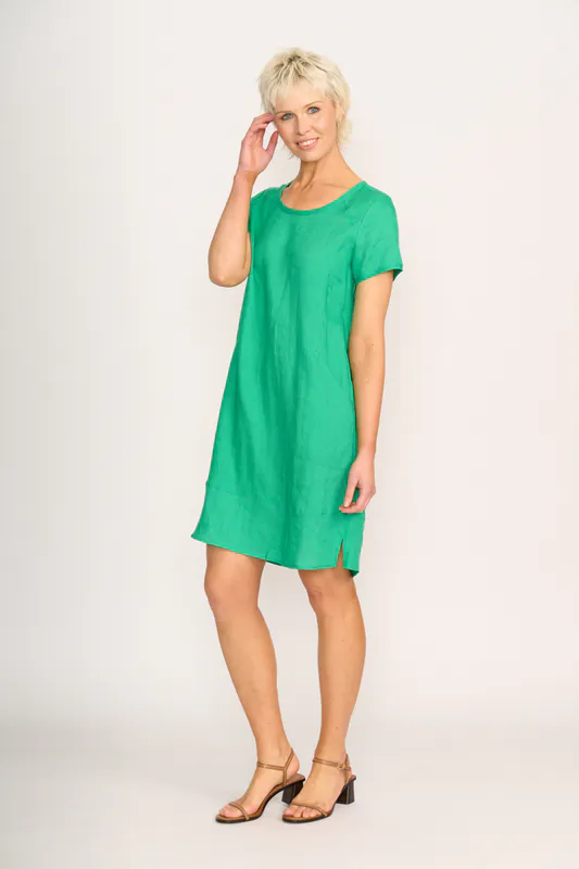 Model wearing Green Dress - Panel Lines By Foil Available at Beetees Nelson