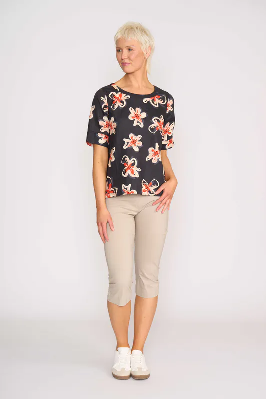Model wearing Flower Doodle Pleat Back Top By Foil Available at Beetees Nelson