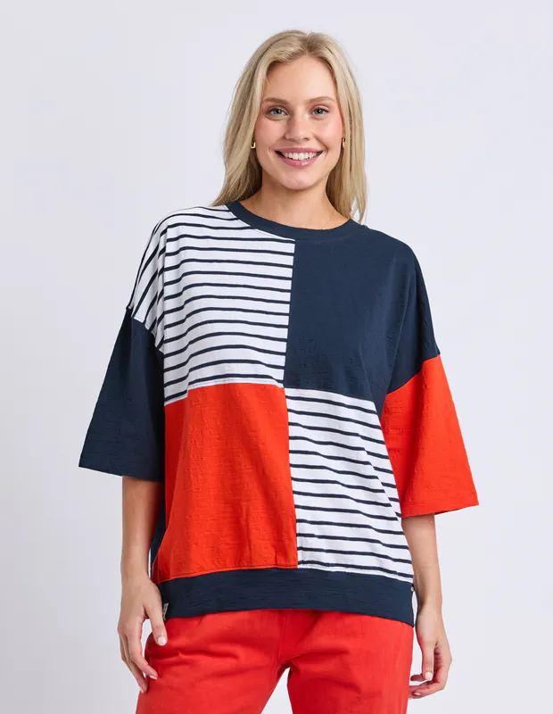 Model wearing Navy/Tangello Fig Sweat By Elm Available at Beetees Nelson