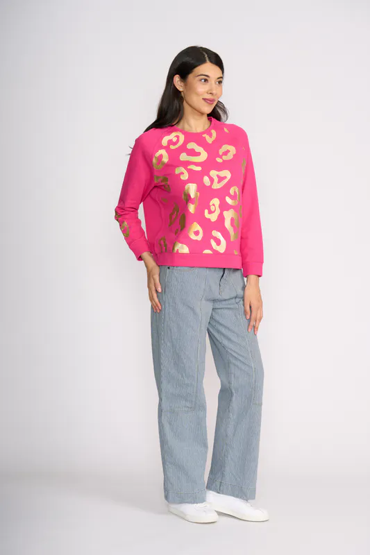 Model wearing Electric Fuchsia Notch Detail Sweatshirt By Foil Available at Beetees Nelson