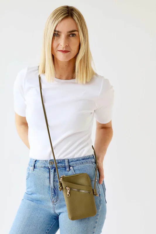 Model wearing Olive Green Long Cross Body Shoulder Strap Bag By Archer House Available at Beetees Nelson