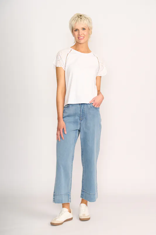 Model wearing White T-Shirt - Broderie Sleeve By Memo Available at Beetees Nelson