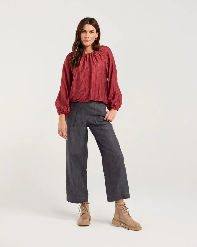 Model wearing Monet's Garden Addison Bubble Hem Top By Blackstone Available at Beetees Nelson