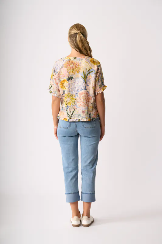 Model wearing Peonies Ruffles & Scoop Hem Top By Foil Available at Beetees Nelson