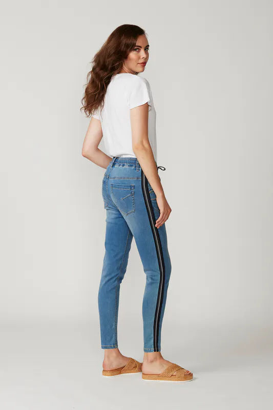 Model wearing distressed LTL Boyfriend Jean By Lania Available at Beetees Nelson