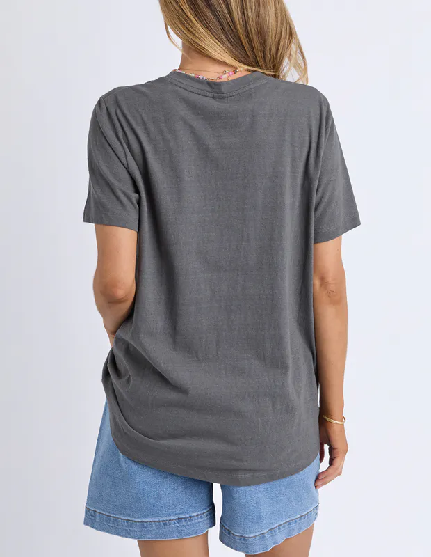 Model wearing Charcoal Fruit Market Tee By Elm Available at Beetees Nelson