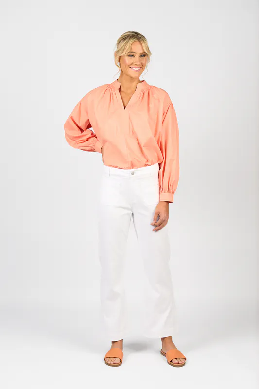 Model wearing White Denim Wide Leg Ankle Grazer Jean with Front Patch Pockets By Vassalli Available at Beetees Nelson
