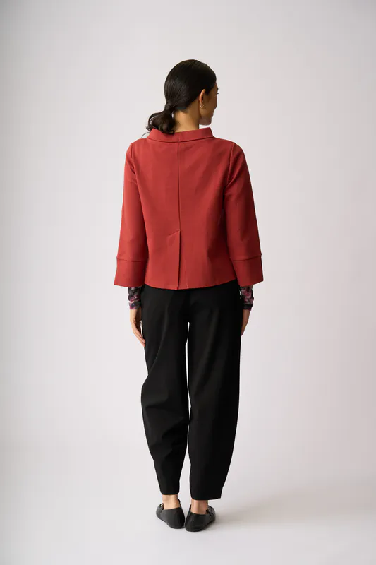 Model wearing Rust Relaxed, Split Back Jumper By Memo Available at Beetees Nelson