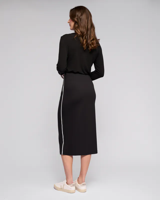 Model wearing Black Maple Skirt By Vassalli Available at Beetees Nelson